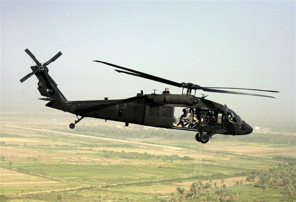 A US Army Blackhawk helicopter flies over a rural area of the Diyala province in this Wednesday, June, 25, 2008 file photo. Two U.S. helicopters crashed Monday in northern Iraq, killing four American troops, the U.S. military said.