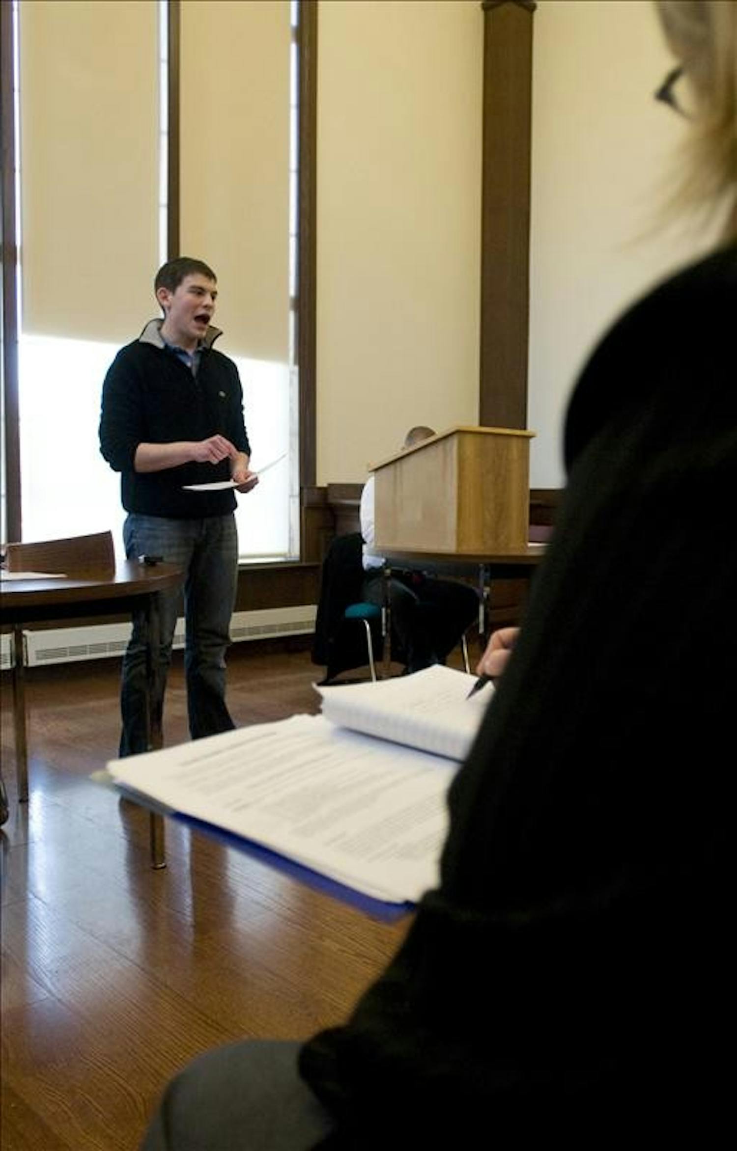 Ari Parker, student at the University of Illinois, delivers part of his speech to a panel of judges Sunday afternoon at the Hutton Honors College building. Parker was a participant in the Intervarsity Lincoln-Douglas Debate Competition sponsored by the new campus group, ABE at IU.