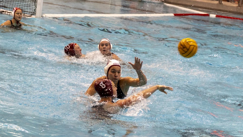 Sophomore attacker Grace Hathaway passes the ball in a game against Stanford March 4, 2023, at Counsilman-Billingsley Aquatic Center. This weekend, Indiana lost to USC and won against Whittier.