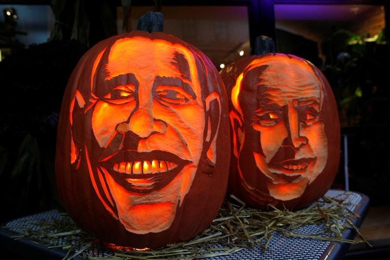 Pumpkins with the faces of the presidential candidates, Barack Obama, left, and John McCain, carved by Hugh McMahon, are displayed Tuesday in New York.