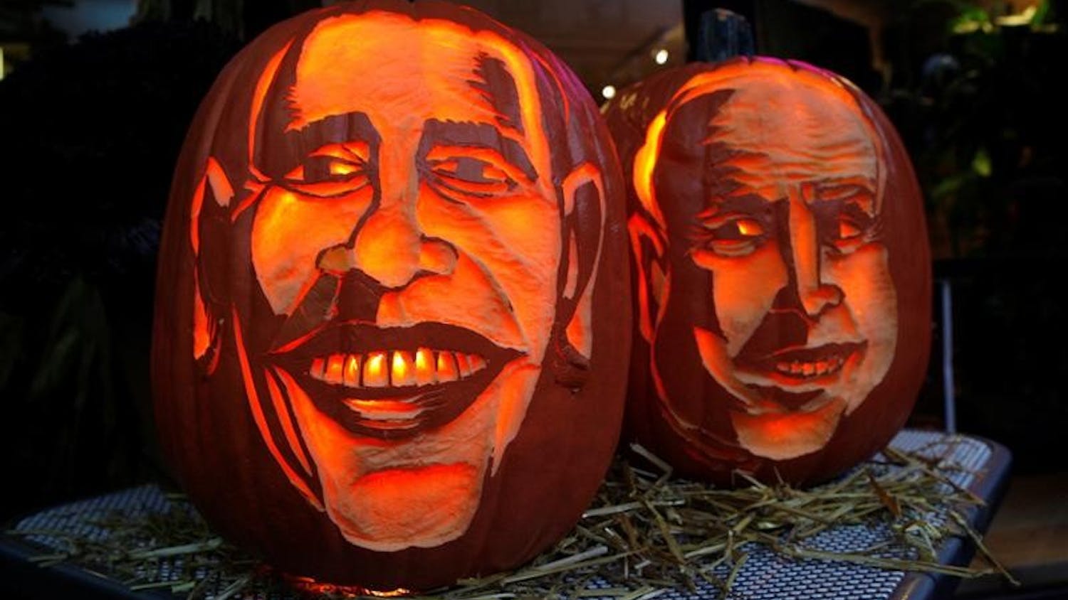 Pumpkins with the faces of the presidential candidates, Barack Obama, left, and John McCain, carved by Hugh McMahon, are displayed Tuesday in New York.