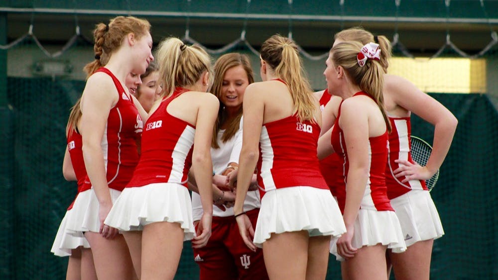 The IU women&#x27;s tennis team huddles Feb. 19, 2017, before a morning match against University of Notre Dame. IU will play Nebraska on March 29. 