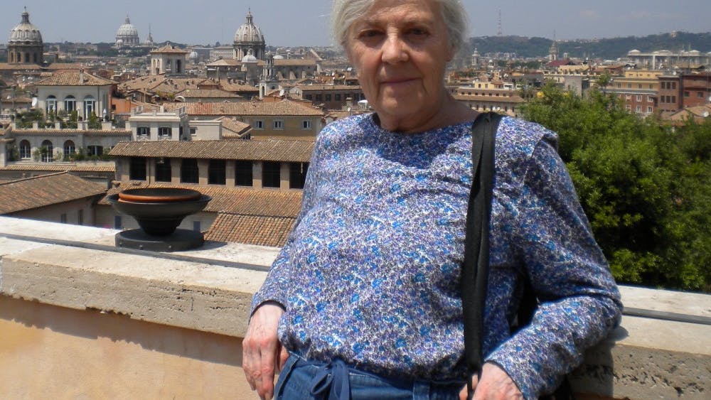 Eleanor Leach, a professor in IU's Department of Classical Studies, stands in Rome in 2011 on one of her many trips with students. Leach was found dead last Monday in her home. She was 80 years old.