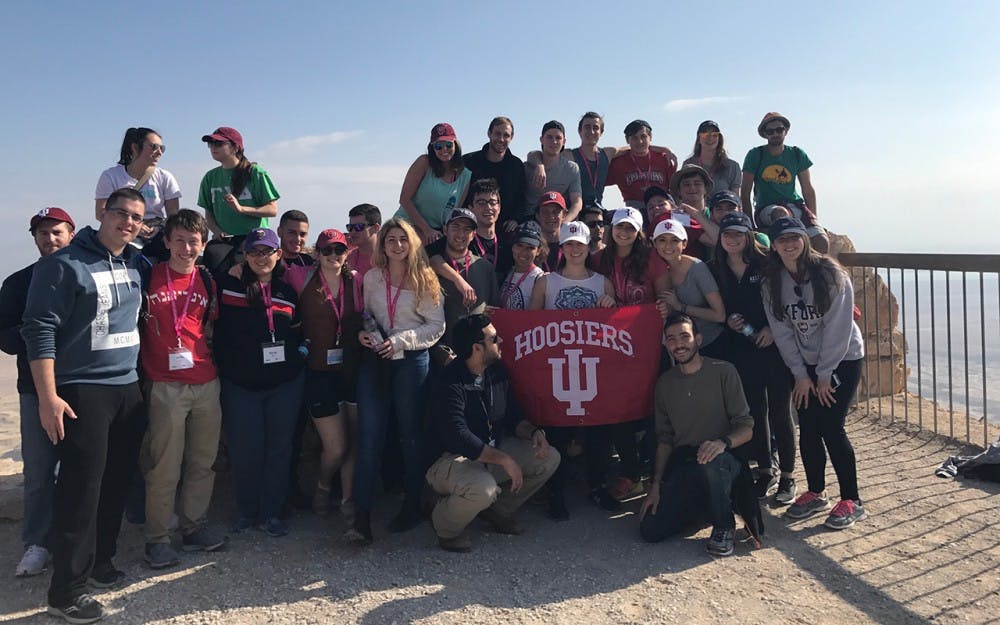IU students who attended the Winter 2016 Birthright Israel trip through IU Hillel pose for a photo at Masada in the Judean Desert. In the winter, about 40 students attend the Birthright Israel trip, while the summer trips take about 80 students.