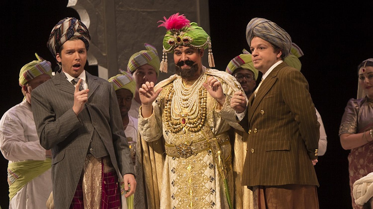 Maharaja, played by Andrew Richardson, center, performs during the dress rehearsal of IU Opera's "Last Savage" on Tuesday in the Musical Arts Center.
