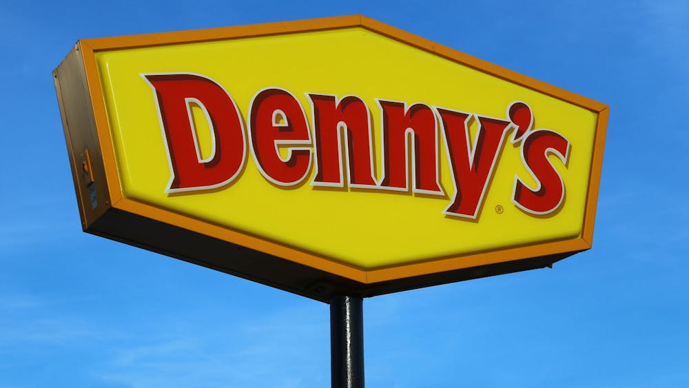 Denny&#x27;s restaurant signage is shown. The Denny’s located at 2160 N. Walnut St. permanently closed Jan. 23, 2023.   