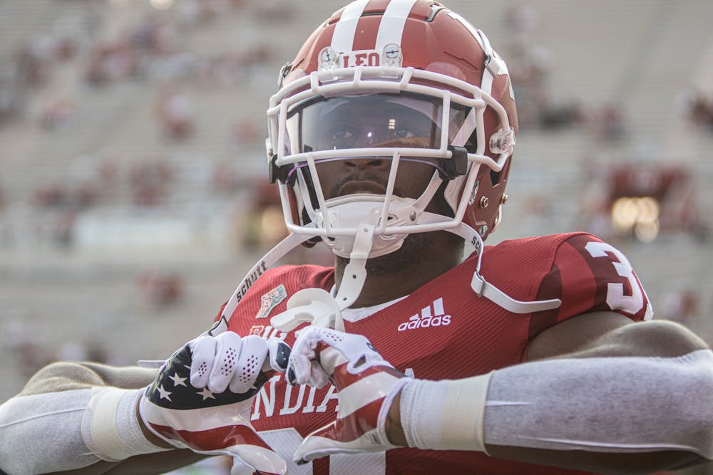 Senior defensive back Bryant Fitzgerald holds his hands in the shape of a heart prior to Indiana’s football game against Idaho on Sept. 11, 2021, at Memorial Stadium. Indiana has a 2-3 record heading into its homecoming game against Michigan State. 