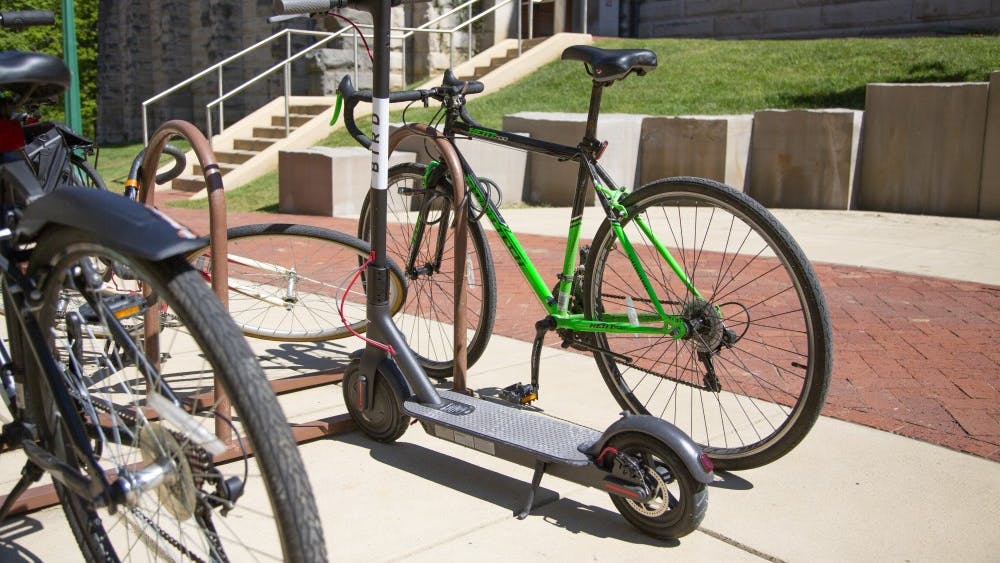 A Bird scooter parked Sept. 14 outside Franklin Hall. The dockless scooter-share program recently became available in Bloomington.&nbsp;