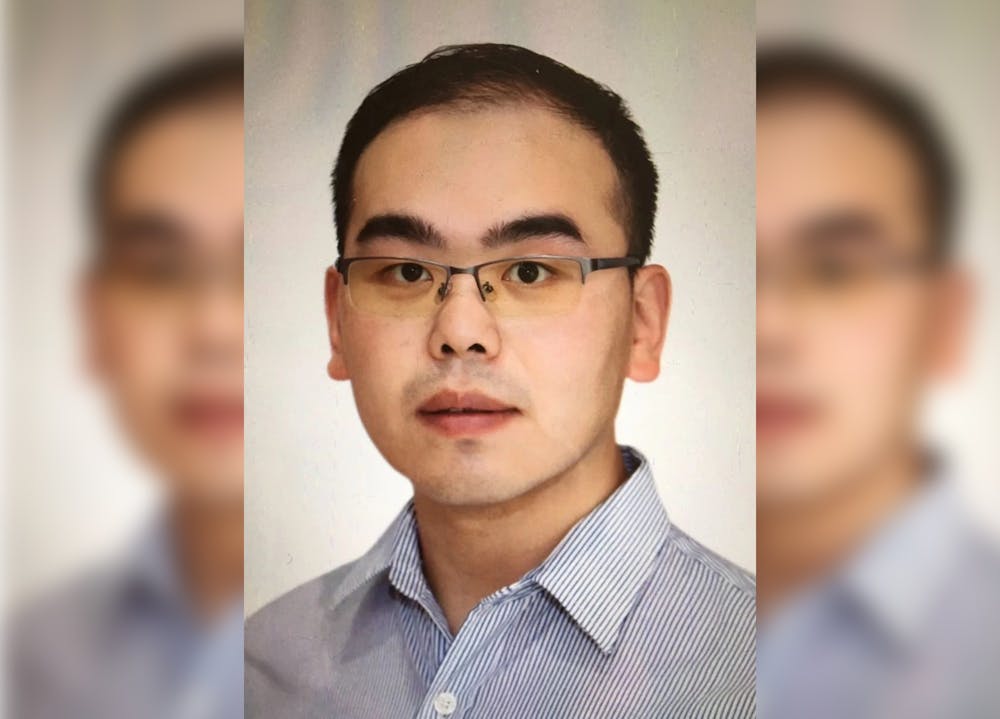 <p>Feng Guo, a bioengineer and assistant professor of intelligent systems engineering at the Luddy School of Informatics, Computing and Engineering poses for a portrait. Guo and other IU researchers, are developing an opioid overdose detection device following a $3.8 million grant from the National Institute on Drug Abuse.</p>