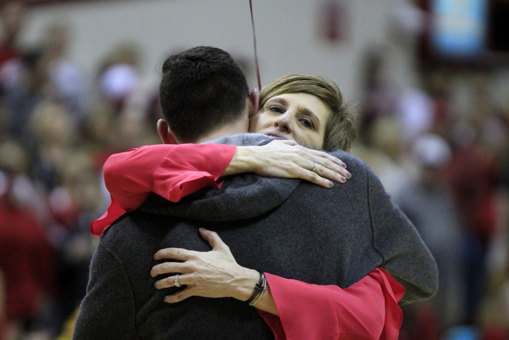 <p>Senior Matt Siegel hugs IU Women's Basketball Coach Teri Moren during Senior Night on Saturday, Feb. 17. Siegel, along with several others, has helped the women's basketball team practice all season.</p>