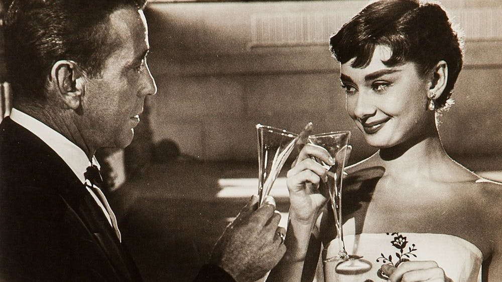 Humphrey Bogart and Audrey Hepburn star in the 1954 romantic comedy "Sabrina."