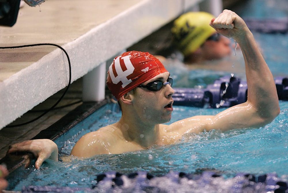 Indiana swimmer Ben Hesen celebrates winning the 100-yard backstroke event in the second day of the NCAA Men's Swimming and Diving Championships Friday, March 28, 2008 at the Weyerhauser Aquatic Center in Federal Way, Wash. (AP Photo/Ted S. Warren)