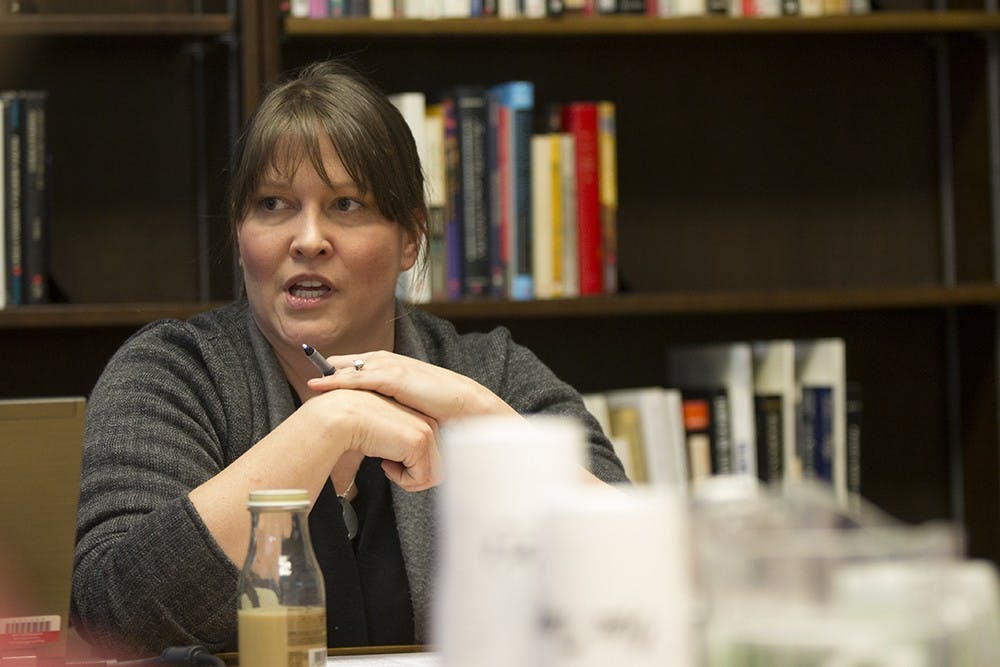 Kelley Benham French, Professor of Practice in Journalism at the IU Media School, speaks during a Poynter Roundtable event on Monday at the Poynter Center. French discussed her serial narrative "Never Let Go", a piece that tells her story of having a micro-preemie baby and was a finalist for the Pulitzer Prize. 