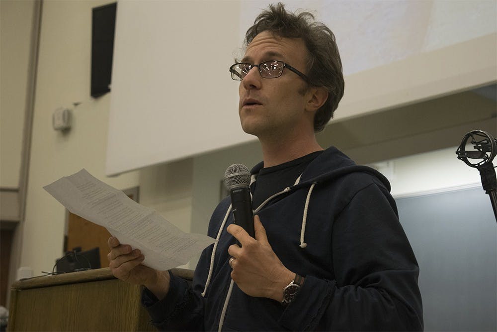 Alex Chambers presents a topic called "Dispersal" during the event called Bridging Toxic Links Wednesday evening in Woodburn Hall. Environmental issues and intersectional injustice were discussed during the event.