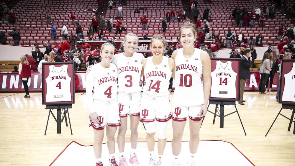 Senior guards Nicole Cardaño-Hillary, Grace Waggoner, Ali Patberg and senior forward Aleksa Gulbe pose during senior night on Feb. 19, 2022, after the game between the Iowa Hawkeyes and the Indiana Hoosiers at Simon Skjodt Assembly Hall. Four Hoosierswill not return to the team next season.