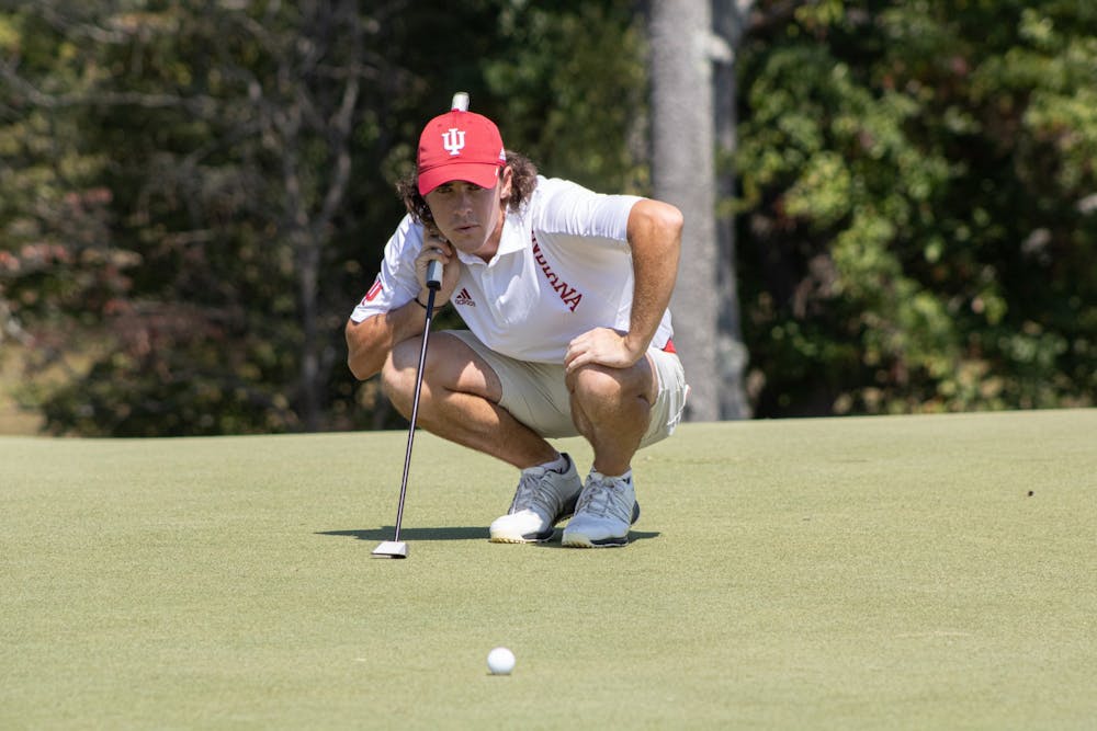 <p>Sophomore Clay Merchent prepares for his turn during the Hoosier Collegiate Invite on Sept. 6, 2021, at Pfau Golf Course. Merchant shot 13-over par and Indiana men’s golf finished in third place.</p>