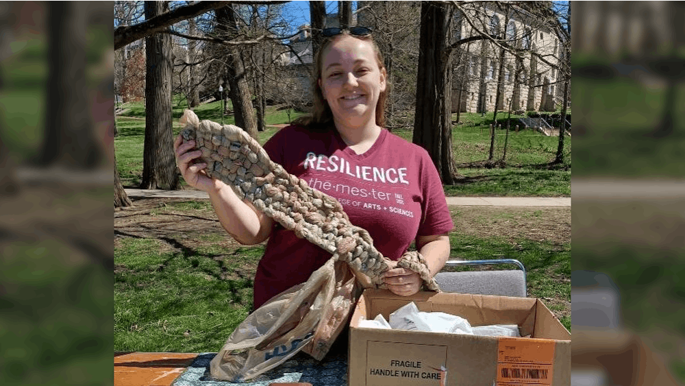 Josie Sparks holds up a woven mat made from plastic bags at last year's Sustainability Fair. This year's fair will be at 2 p.m. on Saturday in Maxwell Hall.