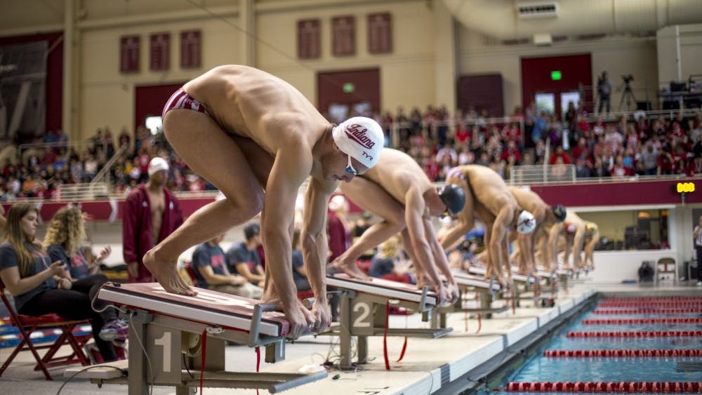 Then-freshman, now sophomore Bruno Blaskovic prepares to dive into the pool for the Men's 100-meter Freestyle Finals on Jan. 20. The IU men's swim and dive team will open its season Wednesday.&nbsp;