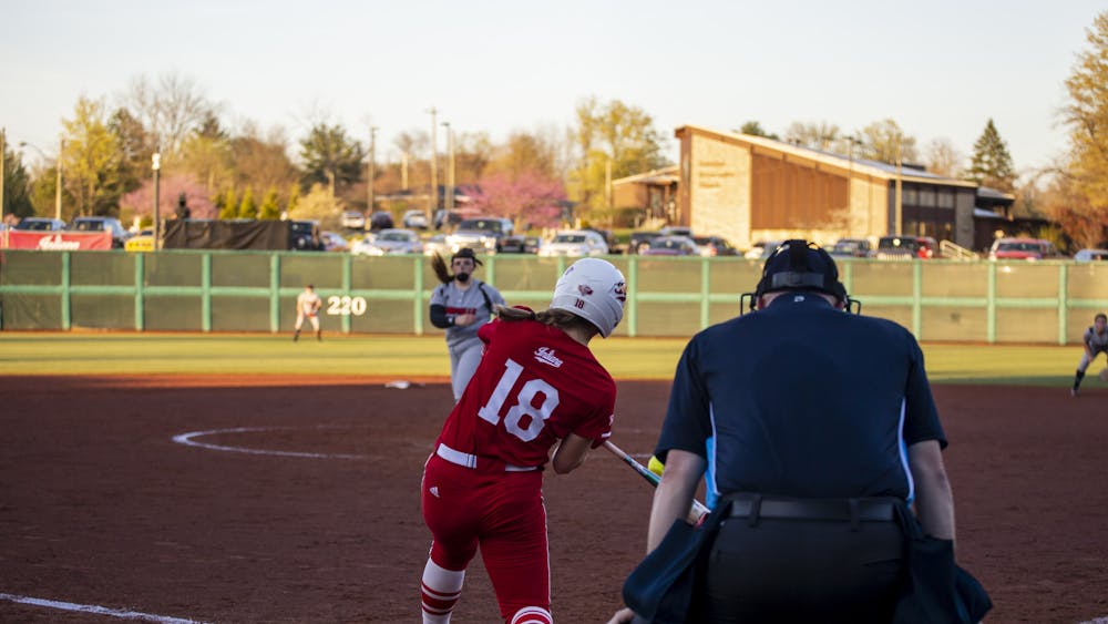 Feshman Avery Parker hits the ball April 11, 2023, at Andy Mohr Field. Indiana lost to Notre Dame 9-1 on Wednesday.