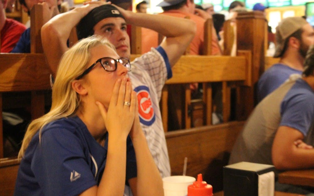Cubs fans anxiously watch during the ninth inning of Game Seven of the World Series.