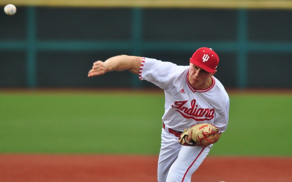 Sophomore pitcher Jonathan Stiever pitches against Minnesota at Bart Kaufman Field on Friday. IU lost 11-0.