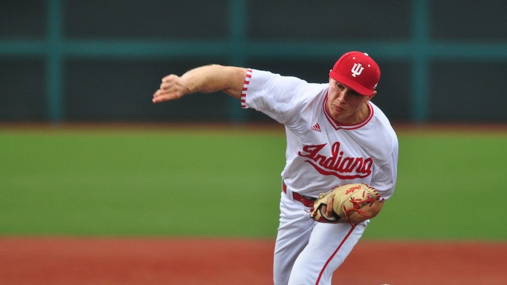 Sophomore pitcher Jonathan Stiever pitches against Minnesota at Bart Kaufman Field on Friday. IU lost 11-0.