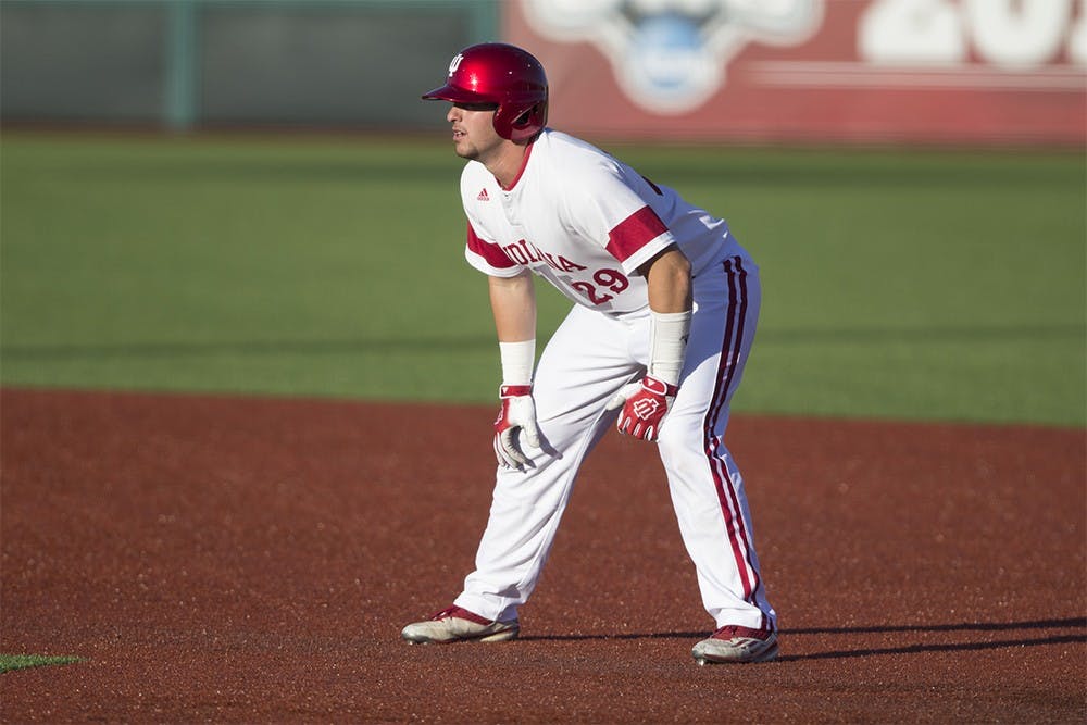 Freshman catcher Ryan Fineman leads off from first base during a game against Ball State on Wednesday night at Bart Kaufman field. IU beat Ball State 4-3.