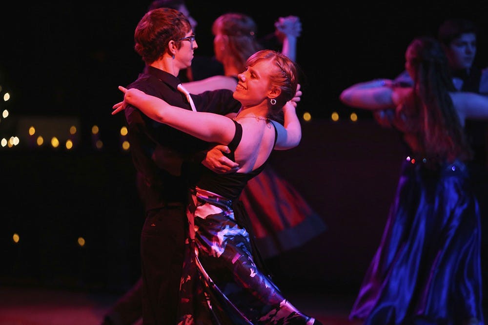 Members of the IU Ballroom Dance Team Erik Kohn and Kristi Starling perform at the Yule Ball on Saturday in Alumni Hall. The event was hosted by Union Board in collaboration with the Harry Potter Society, IU Quidditch Team, and the Student Cinema Guild.