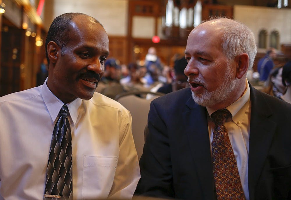 Claude Clegg, left, a Department of History professor and John Applegate, Department of Law professor talk before "It's Not So Black and White" event is begun Thursday at Alumni Hall in the Indiana Memorial Union. The event was to discuss how racial issue has been a continuous issue and how to overcome both locally and nationally. 