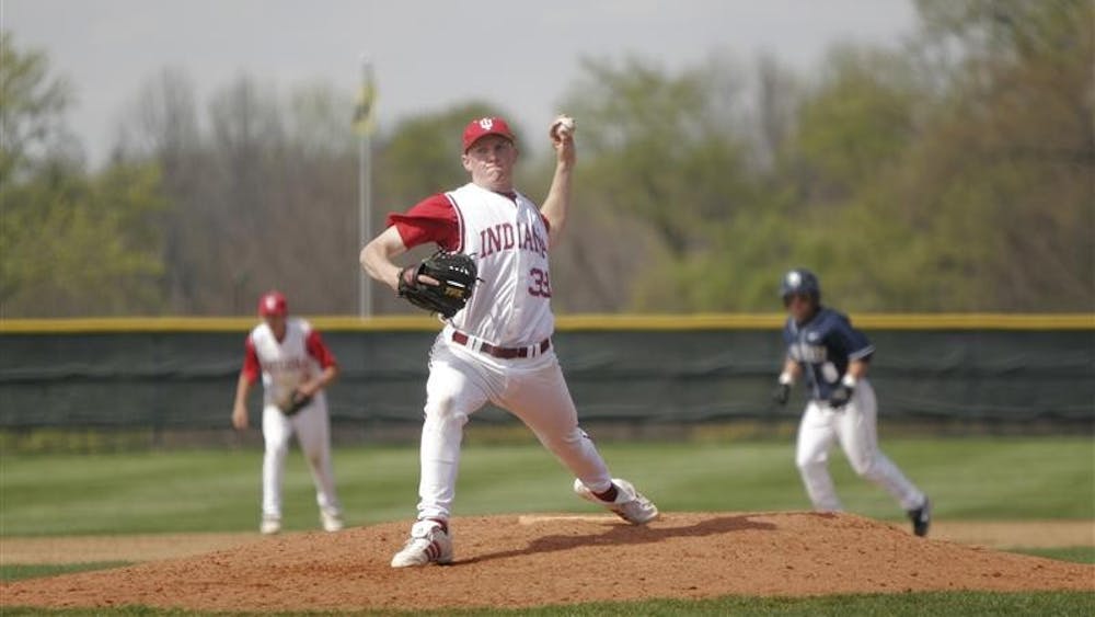 Freshman Reliever Drew Leininger throws the last pitch of the first game of IU's double header with Penn State on Saturday afternoon. This strike cemented the Hoosier's 12th strikeout.