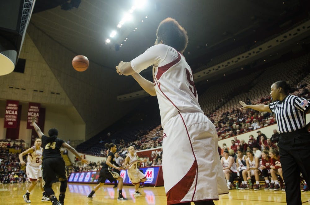 Sophomore guard Larryn Brooks attempts the pass the ball through a pressuring Purdue defense at Assembly Hall on Monday. IU won 72-55 and will play its next game against Northwestern on Thursday.