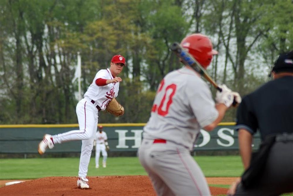 Redshirt sophomore Matt Carr pitches to Miami of Ohio's Eric Darlage during the first inning of the Hoosiers' 9-6 loss to the RedHawks on Tuesday afternoon at Sembower Field. Carr walked two runs home during a four-run fifth inning for the RedHawks, which upped the score to 6-2.