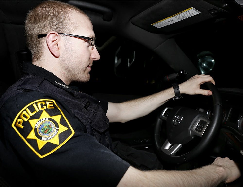 IUPD officer Pablo Pesa patrols on the campus Sunday evening. In recent shift change, Pesa works 12 hours from 6pm to 6am 