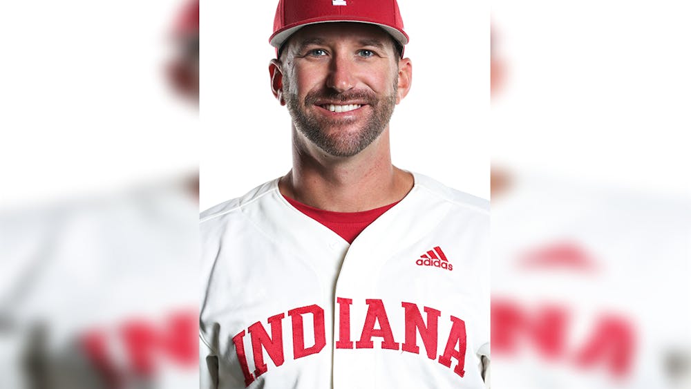 Former IU baseball pitching coach Justin Parker poses for a headshot. Parker was hired for the same position at the University of South Carolina last Thursday.