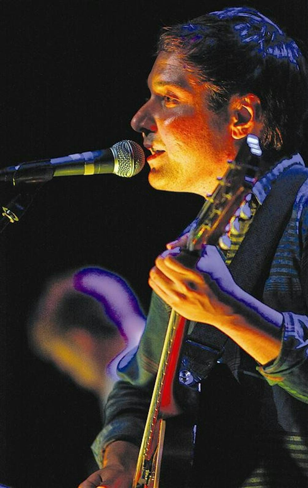 Daniel Rossen of Grizzly Bear sings Tuesday evening at the Buskirk-Chumley Theater. The band recently released its third album on May 26.