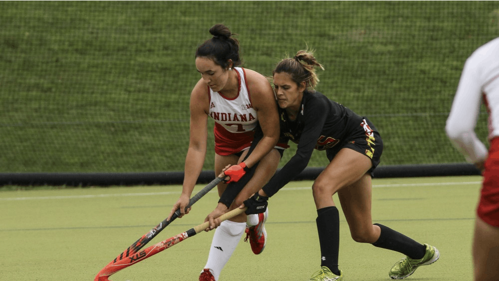 Senior Nora Auker challenges Maryland senior Sabrina Rhodes for the ball. The Hoosiers lost to Maryland 4-0 on Friday, Oct. 12.