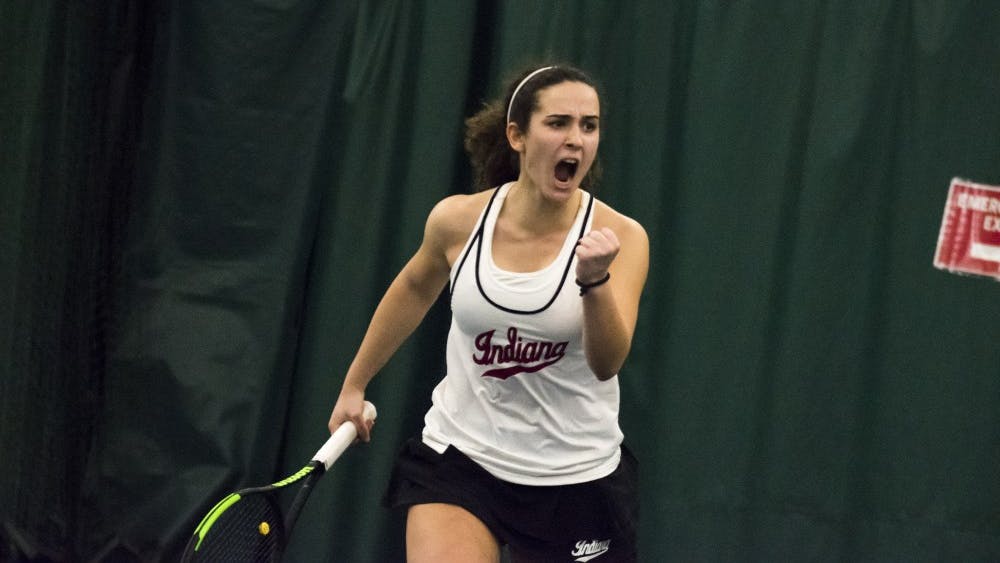 Then-freshman, now sophomore, Jelly Bozovic celebrates winning a point during her win March 3 over Miami University. Bozovic went 3-0 in singles play at the Western Michigan Super Challenge this past weekend.