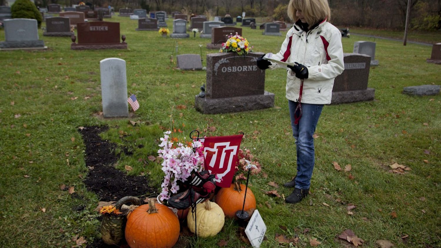 Angi Fiege stands at the grave of her 19 year old daughter Rachael, who died Aug. 23, 2013 after falling down a set of stairs at her first party at IU. In the months after her death, Rachael's family and friends have been burdened by misconceptions of who their daughter was and what really happened to her that night.