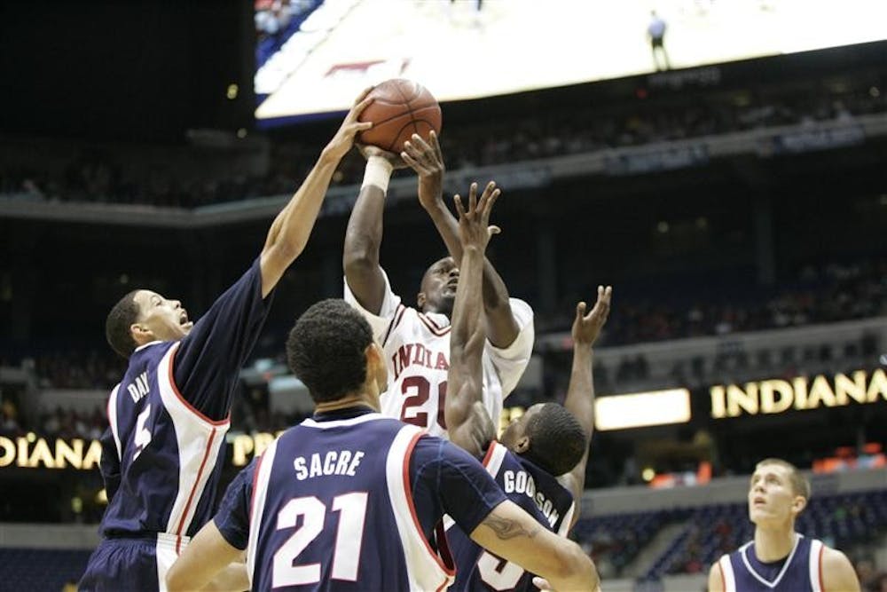 Gonzaga forward Austin Daye blocks IU freshman guard Nick Williams' shot in the first half of the Hoosiers' 70-54 loss to the Bulldogs on Saturday in Indianapolis. Saturday's contest was the first basketball game ever played inside Lucas Oil Stadium.