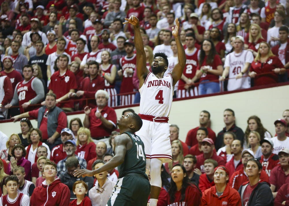 Then-junior guard Robert Johnson, now a senior, shoots a 3-pointer during a January game against Michigan State at Assembly Hall. Johnson will be one of several seniors in their final season with the IU men's basketball program.