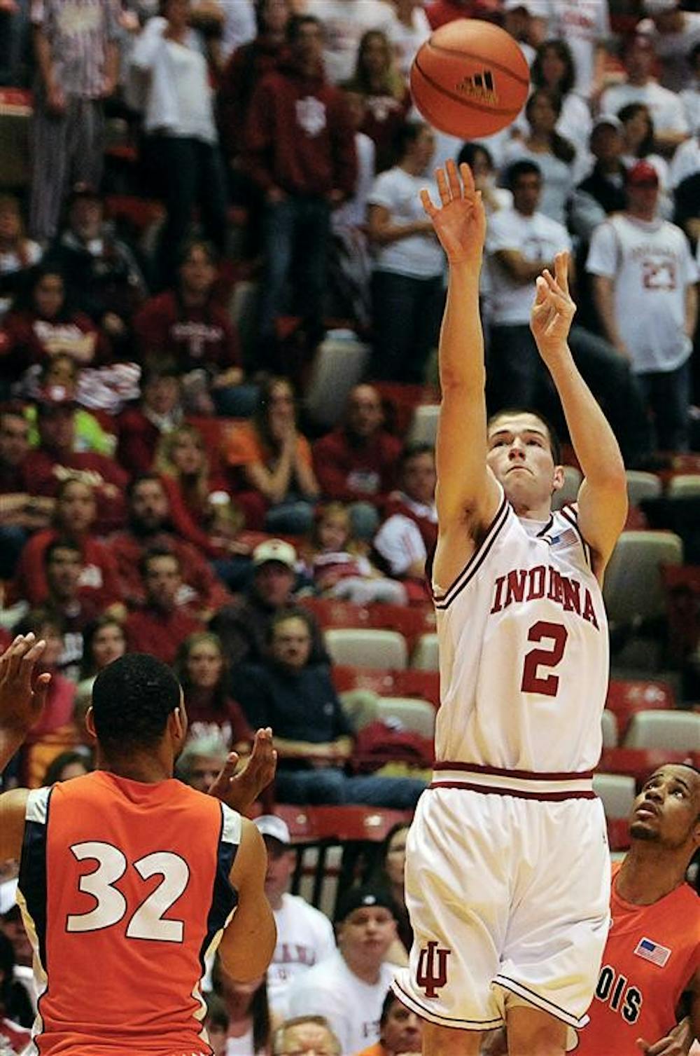IU freshman guard Matt Roth shoots a three-pointer during the second half of IU's 65-52 loss to Illinois Sunday evening at Assembly Hall. Roth led the team with 13 points on three of six shooting from behind the three-point line.