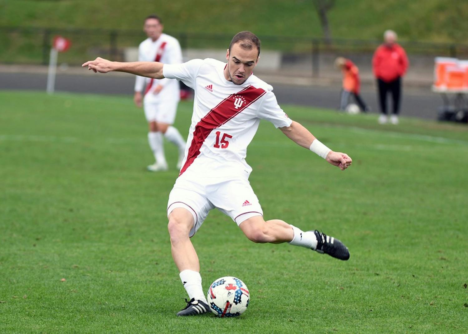 Then-junior defender Andrew Gutman kicks the ball against Ohio State on Oct. 15 at Bill Armstrong Stadium. Gutman was named a preseason First Team All-American on Monday.