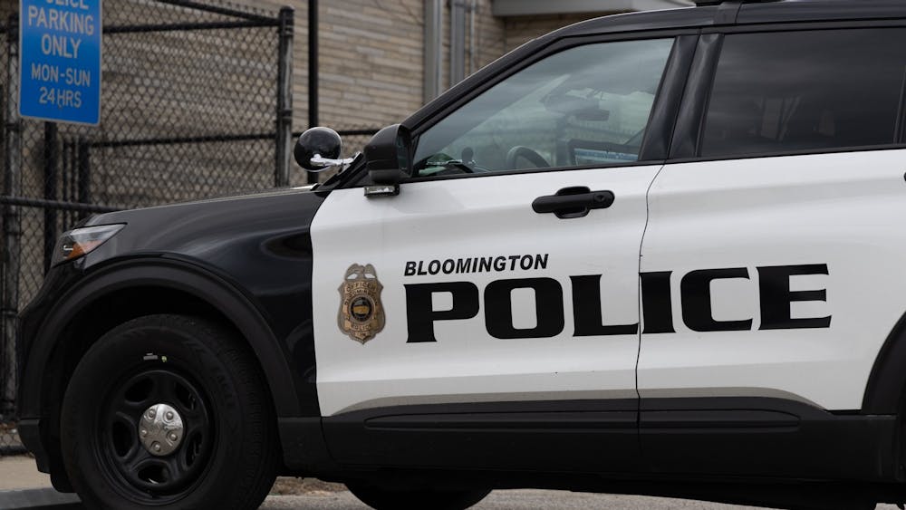 A police car is parked outside the Bloomington Police Department on Feb 22, 2023. House Bill 1186, authored by Rep. Wendy McNamara, R-District 76, would make it a crime for a person to approach a law enforcement officer within 25 feet after being told to keep away.