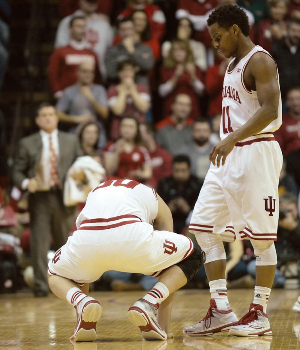 Sophomore Collin Hartman takes a breather during IU's game against Purdue on Thursday at Assembly Hall.