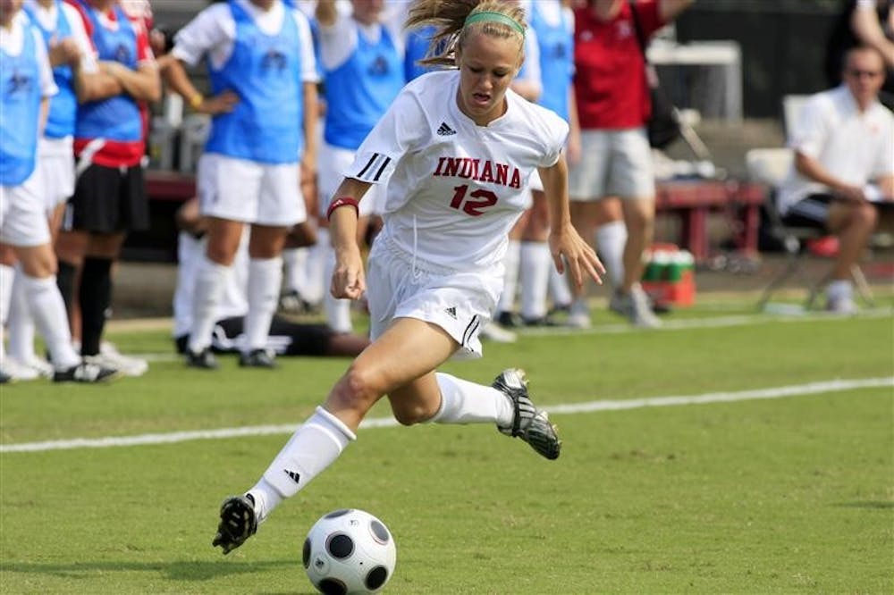 Sophomore Leigh Anne Cummings plays the ball during Sunday's game against Loyola University Chicago at Bill Armstrong Stadium.