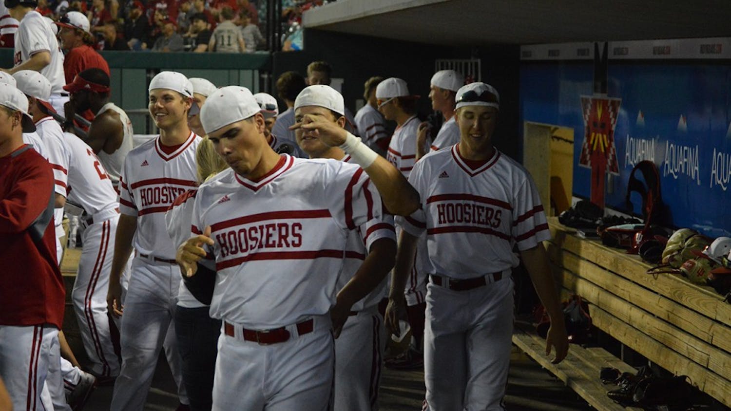Hoosiers get rowdy in the dugout after gaining a lead over Ball State Tuesday night at Victory Field in Ind. IU beat Ball State 4-3. 