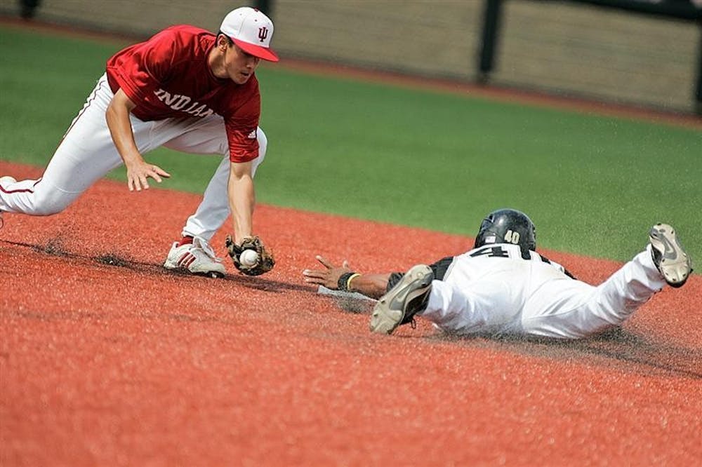 Junior Jake Dunning applies a tag to Vanderbilt's Jonathan White during the Hoosiers 10-0 loss to the Commodores Saturday afternoon at Patterson Stadium. 