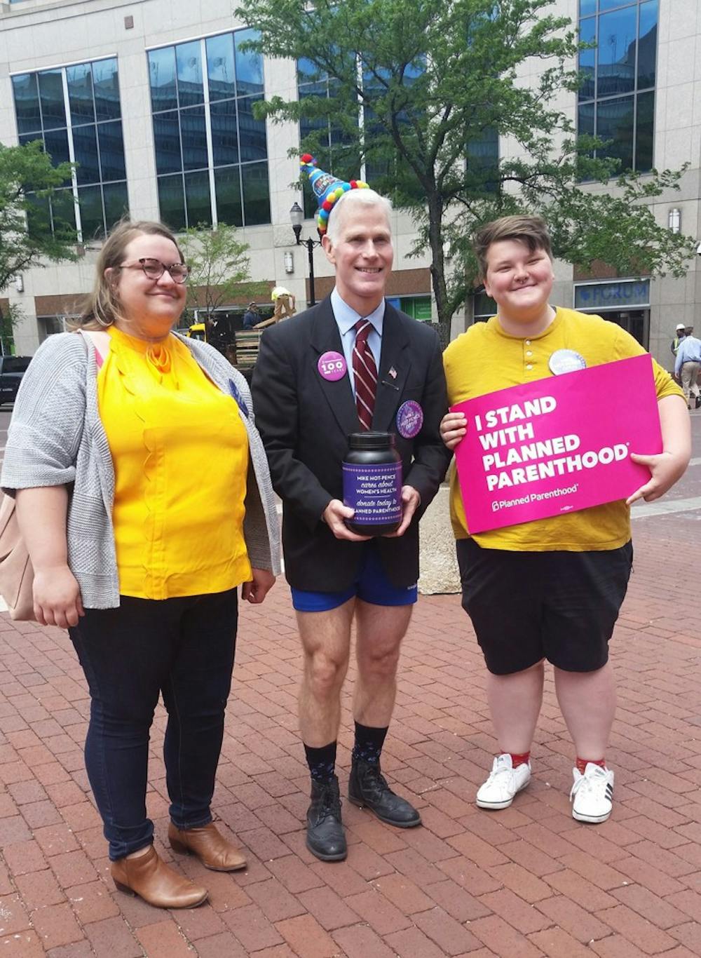 Mike Hot-Pence, a Mike Pence impersonator, stands with Planned Parenthood supporters on Monument Circle in Indianapolis. Hot-Pence raised $1,500 for the organization at an event June 7. 
