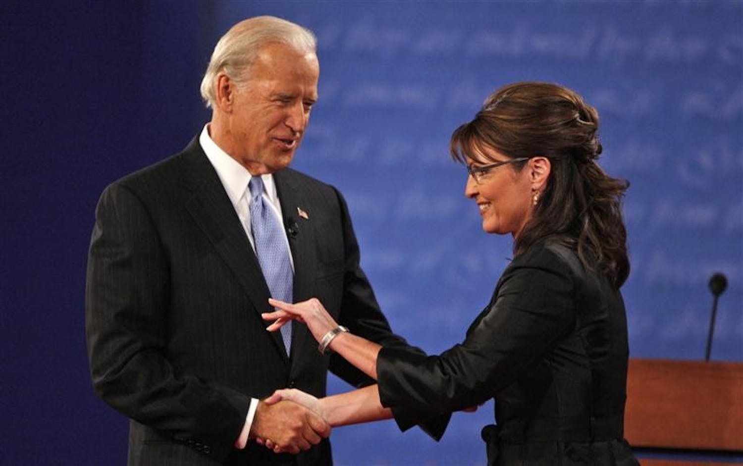 Democratic vice presidential candidate Sen. Joe Biden, D-Del., left, and Republican candidate Alaska Gov. Sarah Palin shake hands before the start of a vice presidential debate at Washington University in on Thursday in St. Louis, Mo.