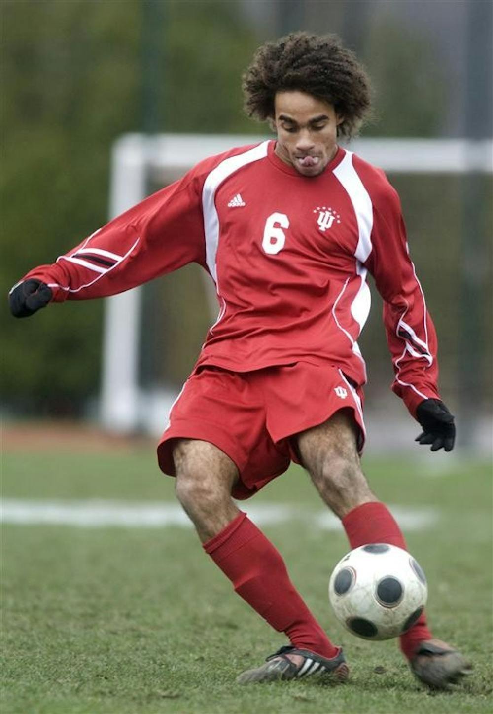 Junior midfielder Kevin Alston passes the ball against Michigan State Nov. 16, 2008 in Madison, Wis.